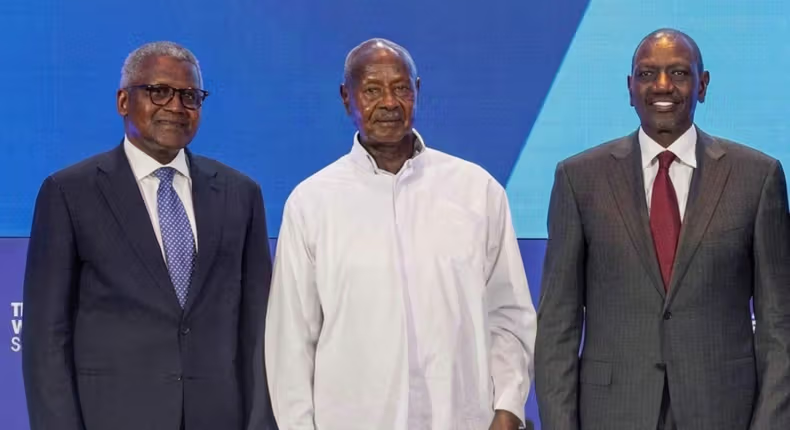 L-R: Africa's richest man and founder of Dangote Group, Aliko Dangote; President Yoweri Museveni of Uganda and President William Ruto of Kenya.
